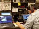 Noah Goldstein, KB1VWZ, at WX1BOX at the NWS Taunton office in Massachusetts. [Rob Macedo, KD1CY, photo] 